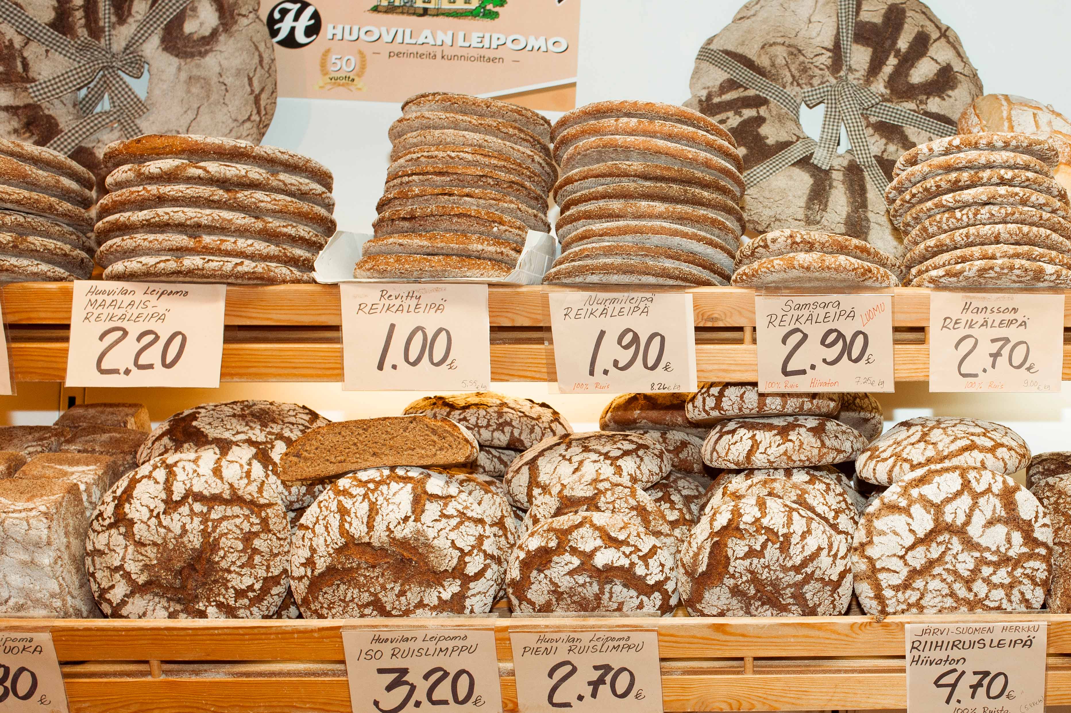 A shelf full of rye bread in market hall in Hakaniemi, Helsinki