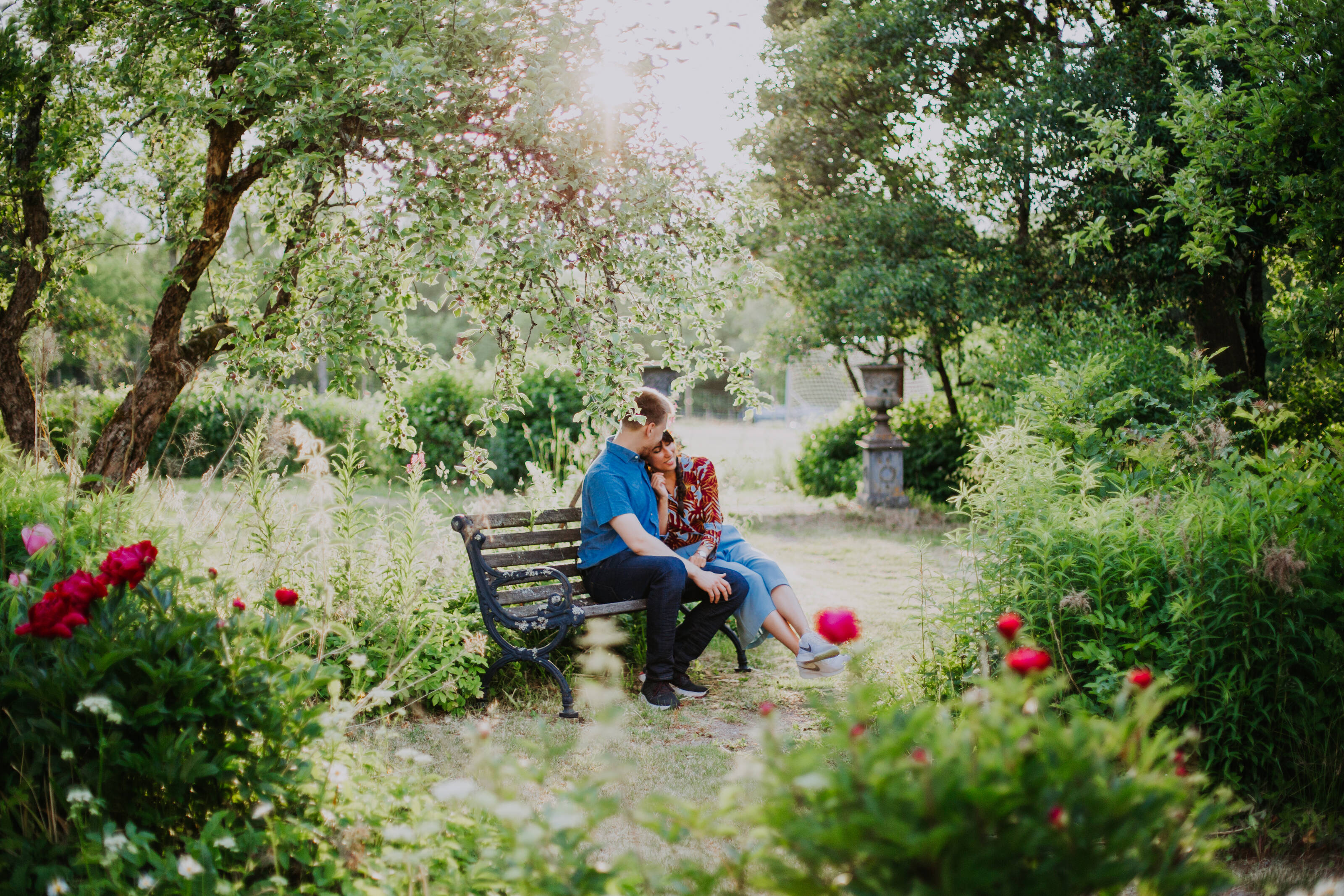 a couple enjoying their time in a public garden