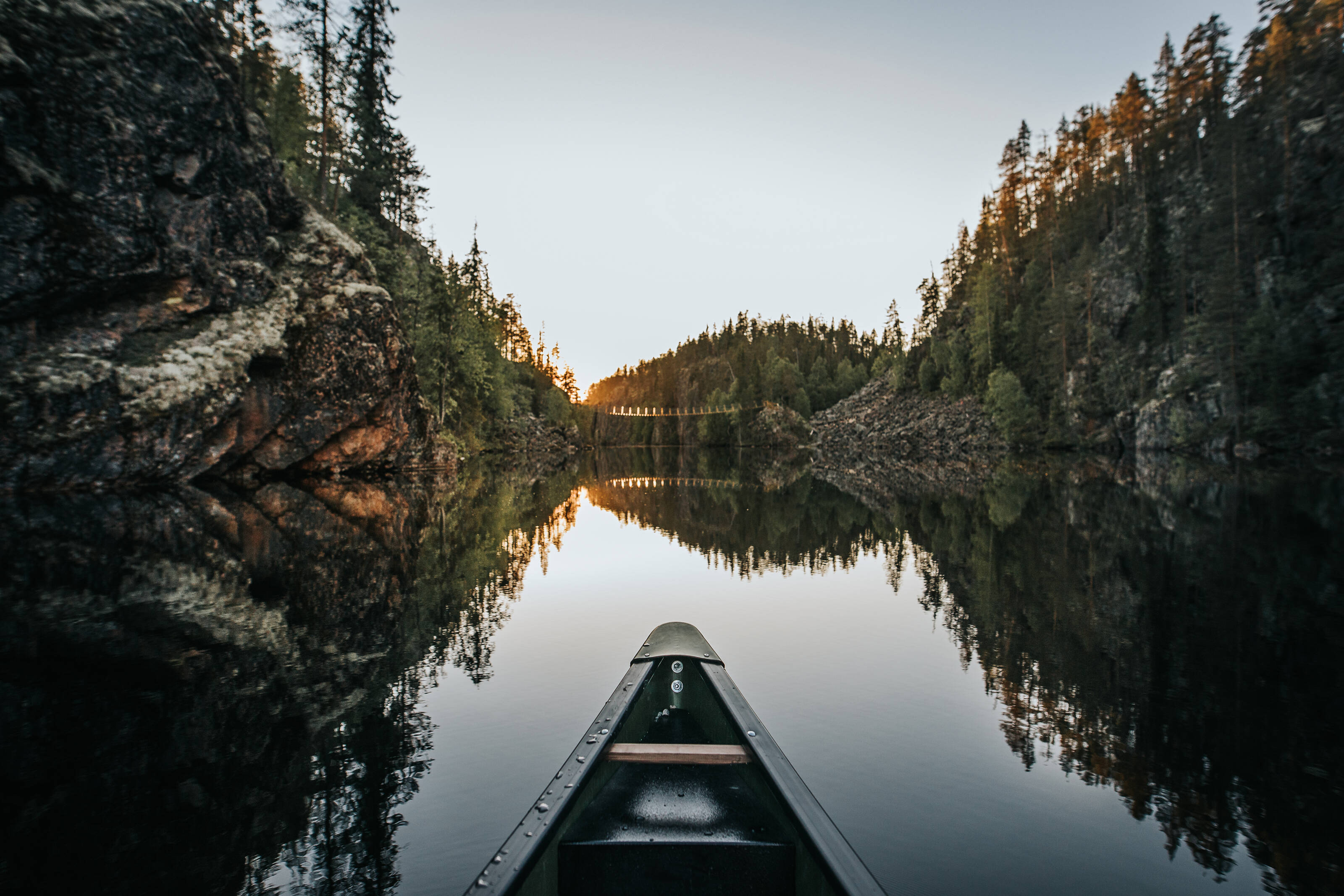 kayaking in Finnish national landscapes on a lake in the middle of a forest