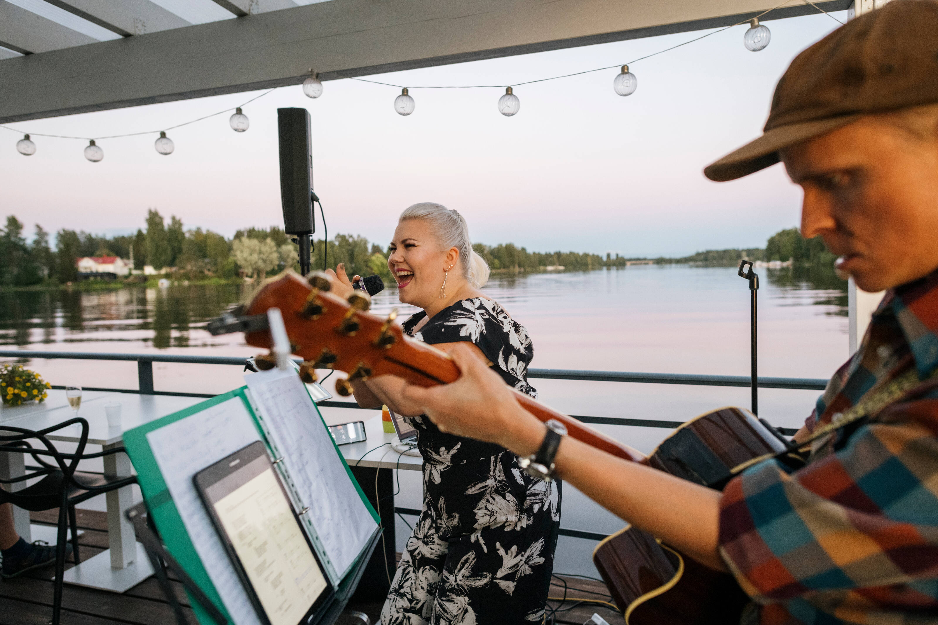 a band performing on a floating sauna raft