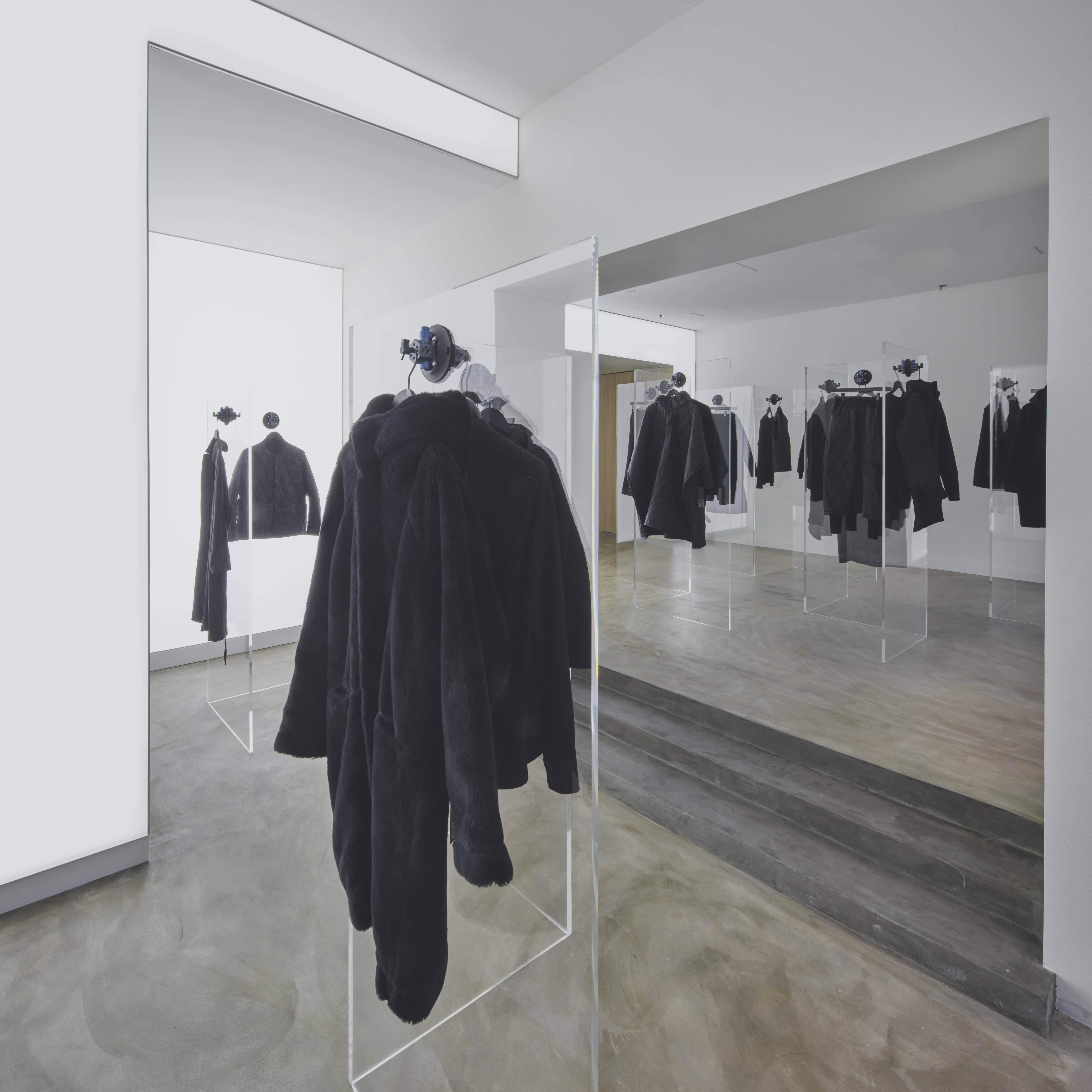 Black, minimalistic clothing displayed at the Nomen Nescio’s flagship store