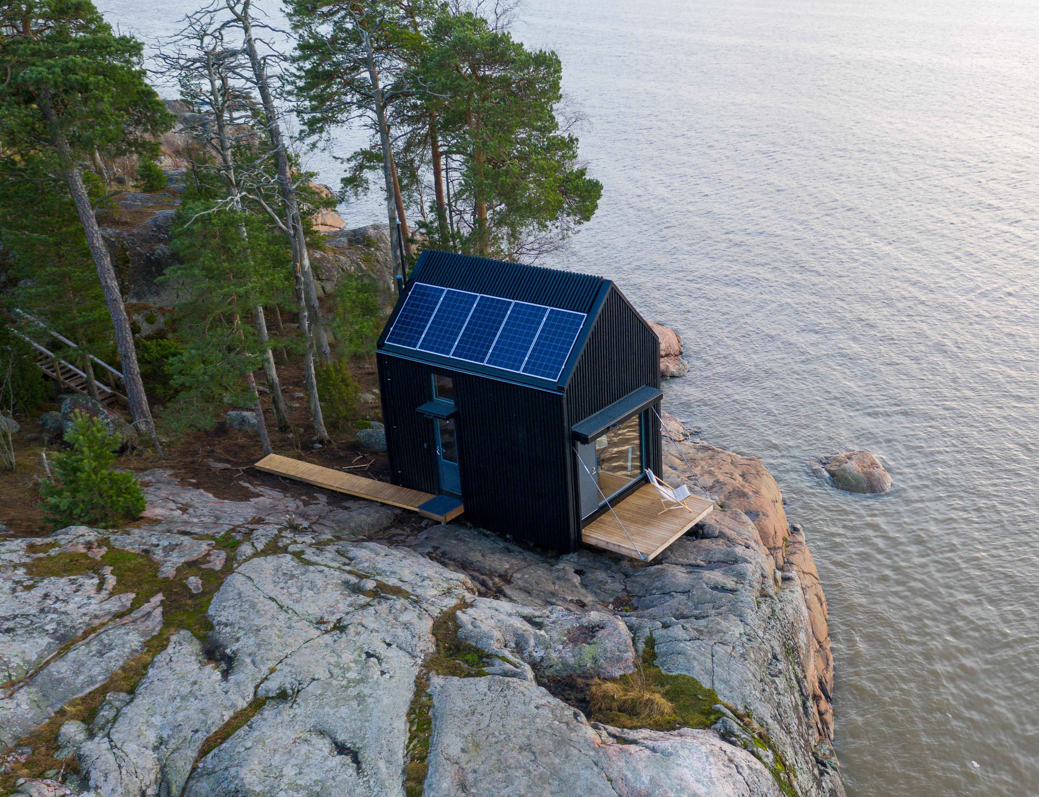 an aerial view of a modern off grid hut