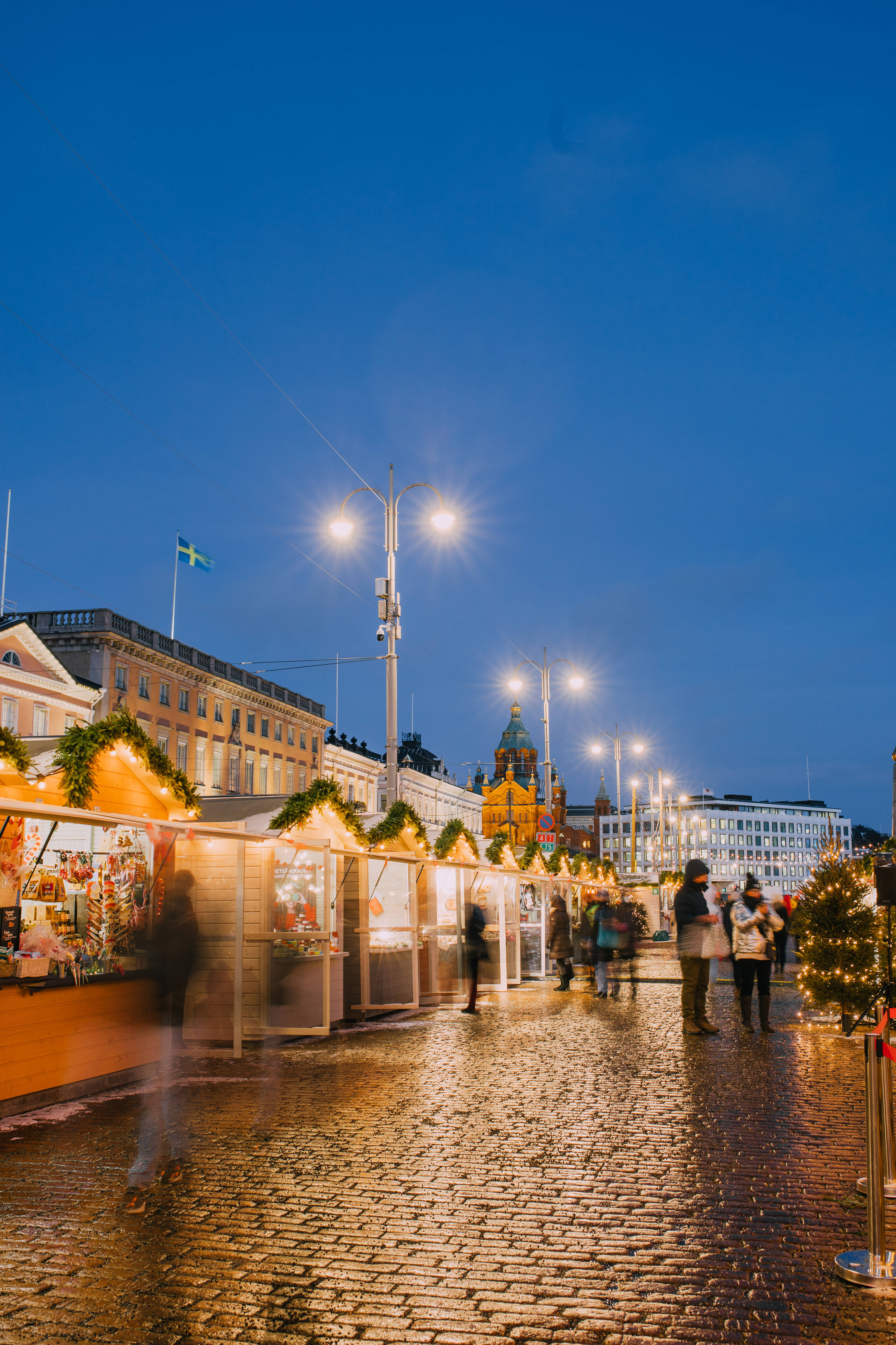 a row of booths in a Christmas market in Helsinki, Finland