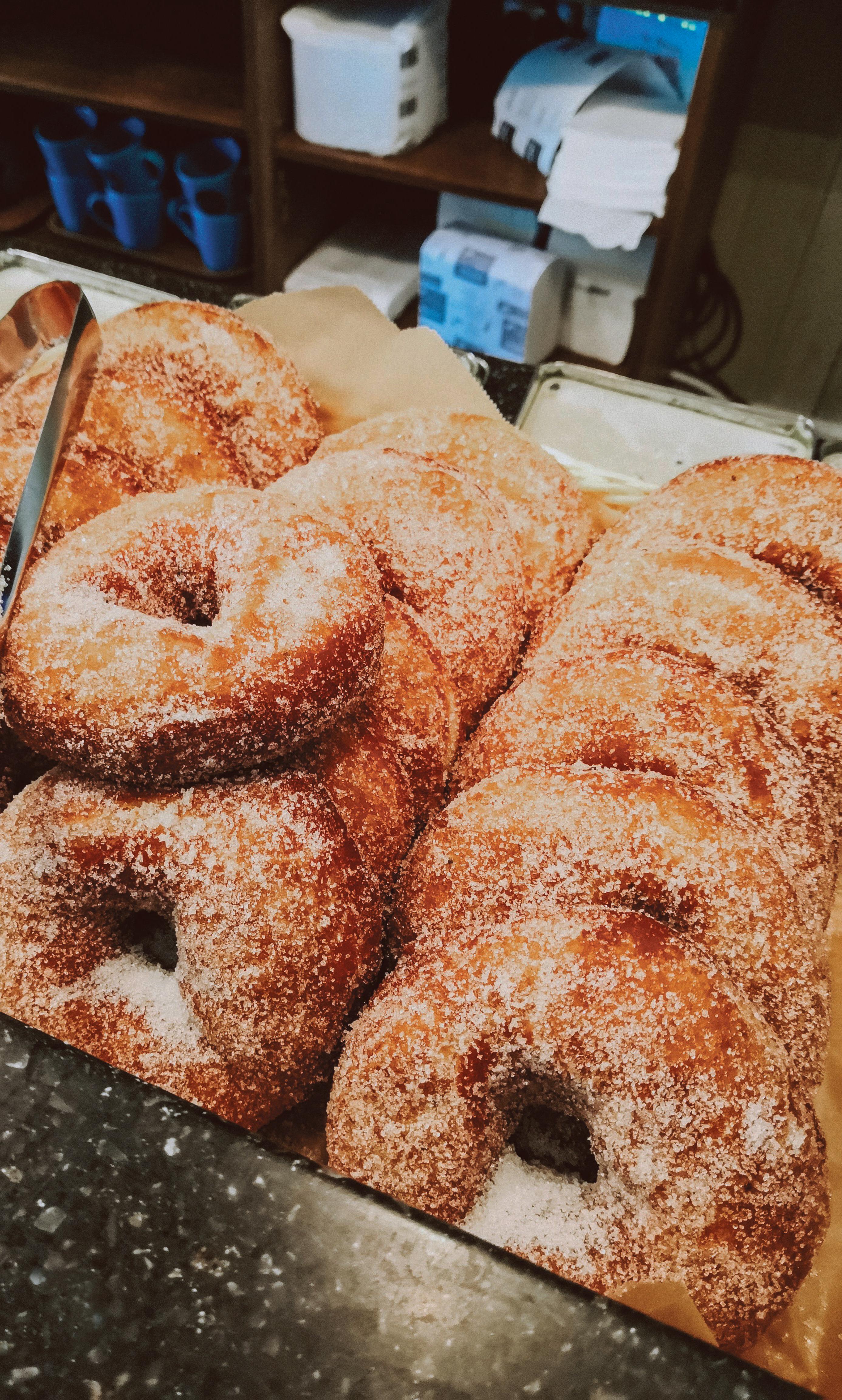 a plenty of donuts on a tray
